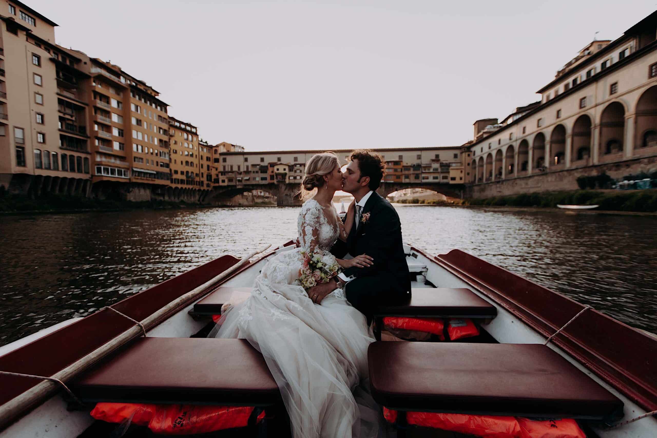 by boat on the Arno River in Florence